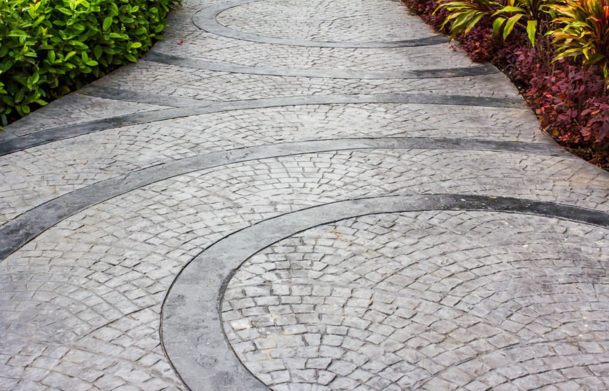 Stamped concrete walkway with circular pattern design in Brea, CA